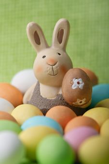Easter Bunny Whit Many Colored Easter Eggs Stock Photo