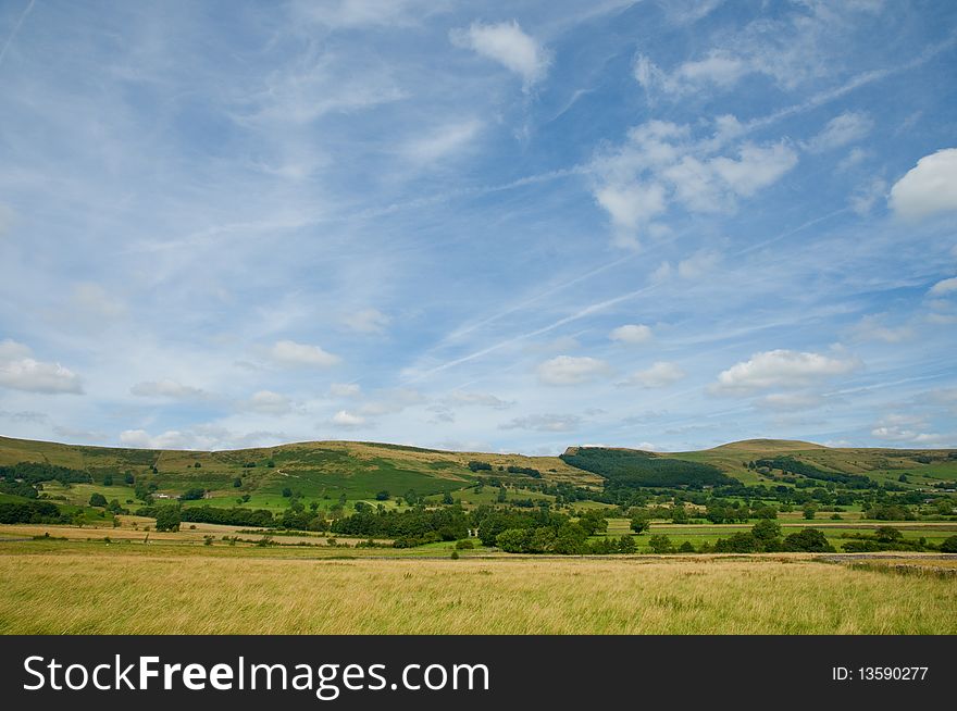 A view at castleton 
in derbyshire in the united kingdom. A view at castleton 
in derbyshire in the united kingdom