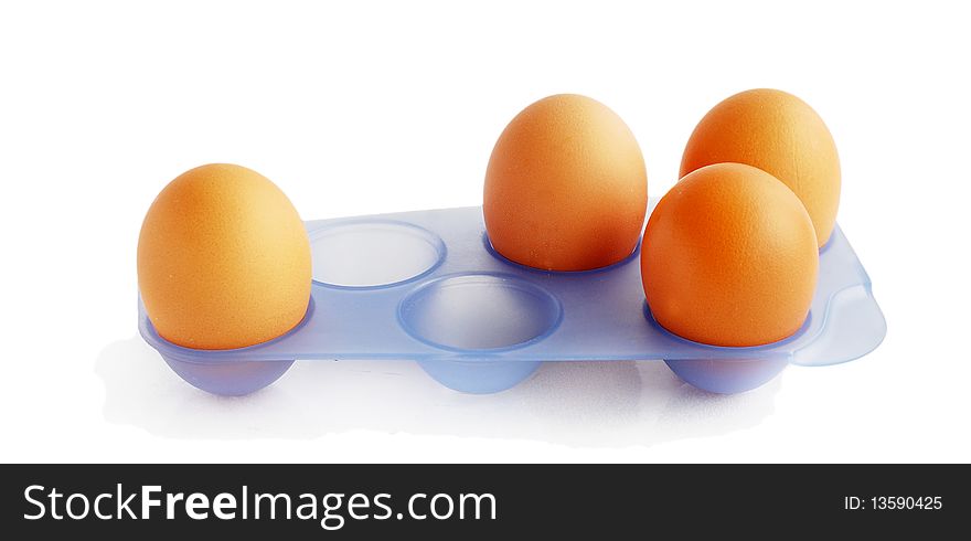Fresh brown eggs  isolated on white