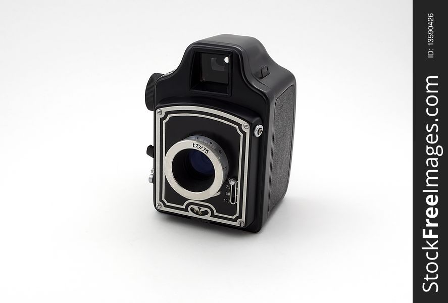 Old camera isolated in frot of the white background