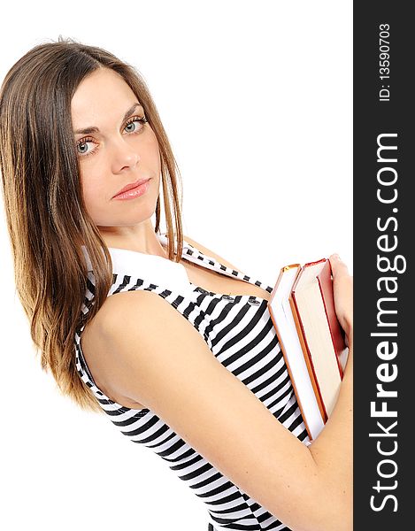 The beautiful girl with long hair holds the book on a white background. The beautiful girl with long hair holds the book on a white background