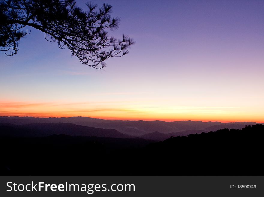 Orange sky during sunset surrounded with mountain. Orange sky during sunset surrounded with mountain