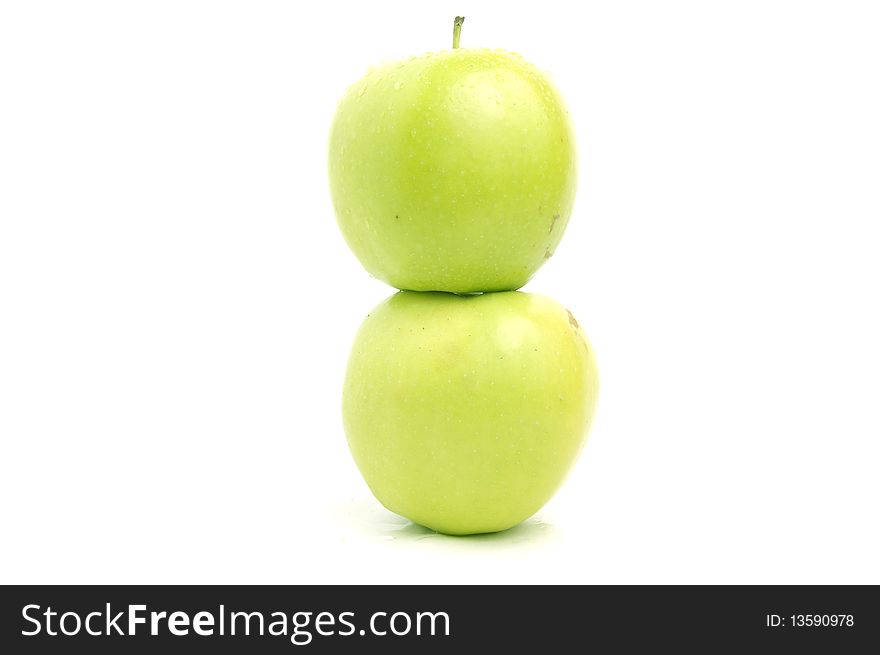 Two green apple on the white background, isolated