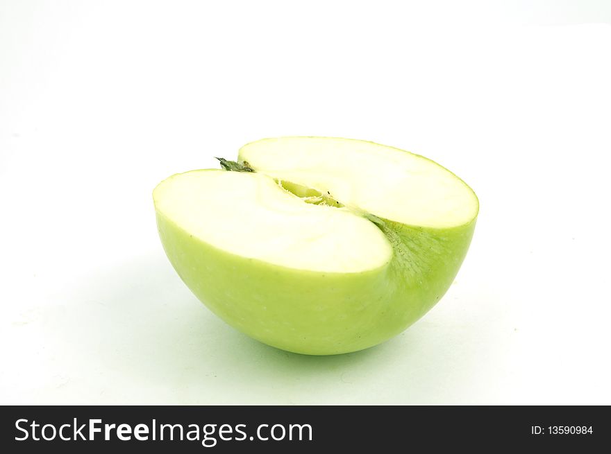 Green apple on the white background, isolated