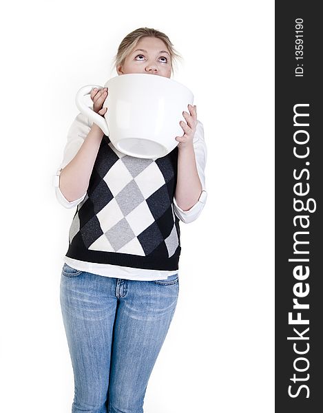 Young woman with a cup, studio shot