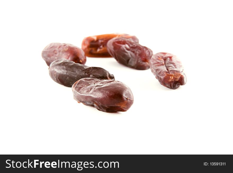 Fresh dates close up on white background