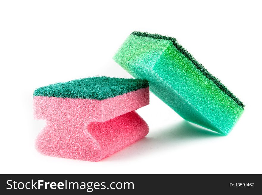 Natural sponge in front of a bright white background. Natural sponge in front of a bright white background.