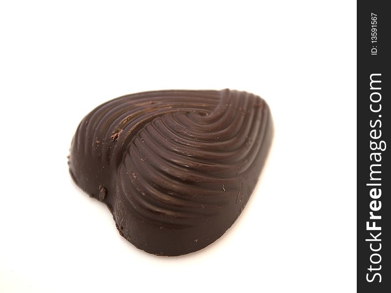 A chocolate heart isolated on a white background