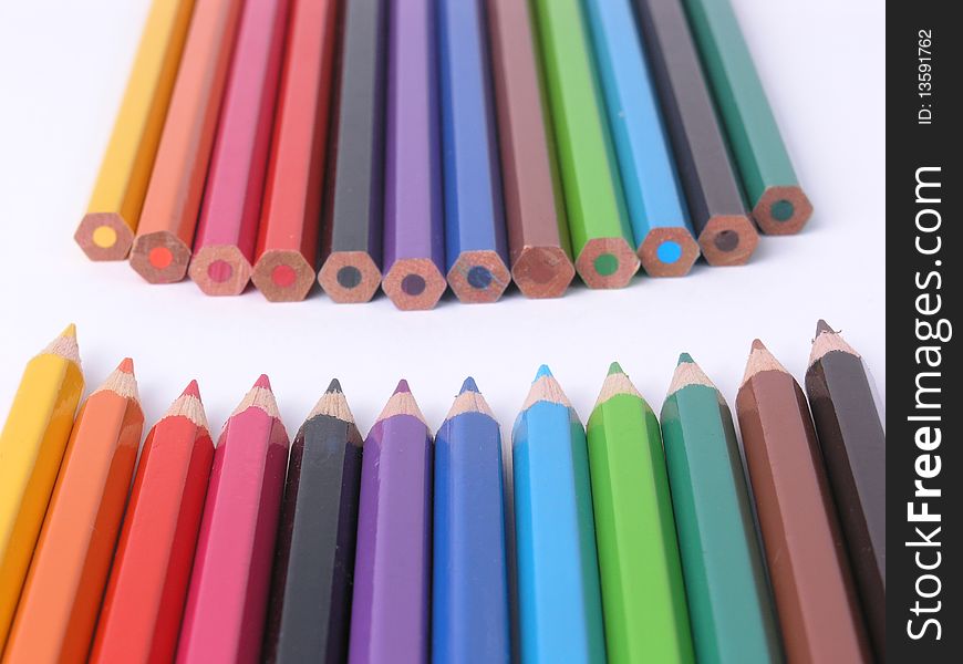 Rows Of Colorful Wooden Crayons