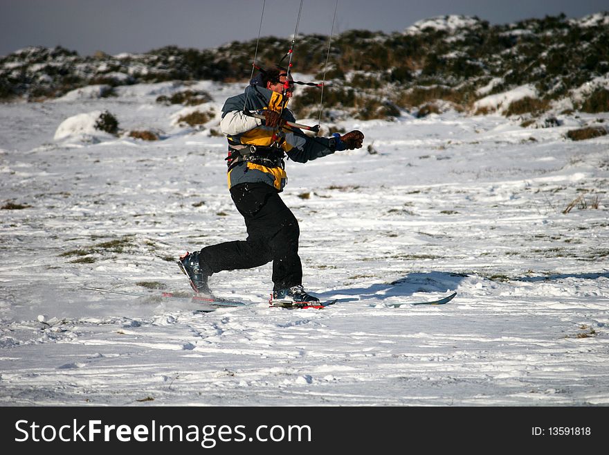 Man kite skiing on Dartmoor. Man kite skiing on Dartmoor