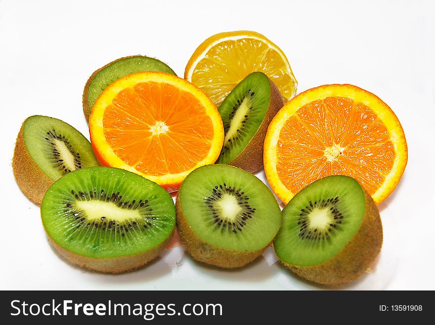 Orange, kiwi and lemon halfs. Orange, kiwi and lemon halfs