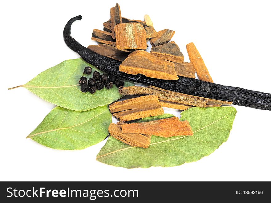 Laurel leaves with spices upon them isolated. Laurel leaves with spices upon them isolated