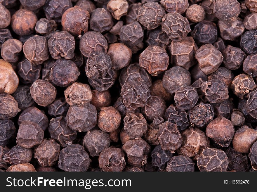 Black pepper balls texture. Background