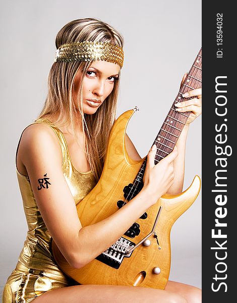 Golden Girl With Electric Guitar