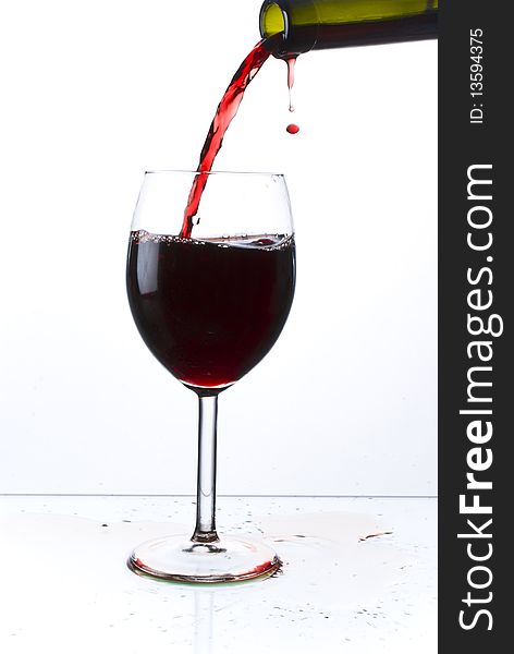 Red wine poured into glass