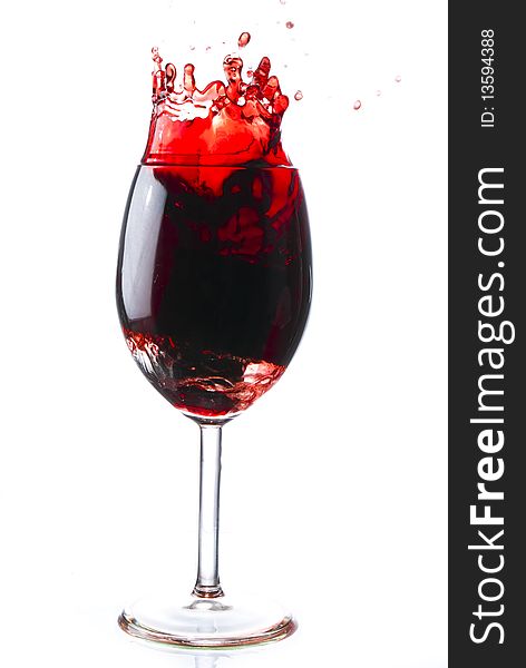 Red wine poured into glass. Red wine poured into glass