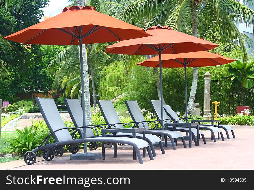 An image showing poolside deckchair for swimmer to relax