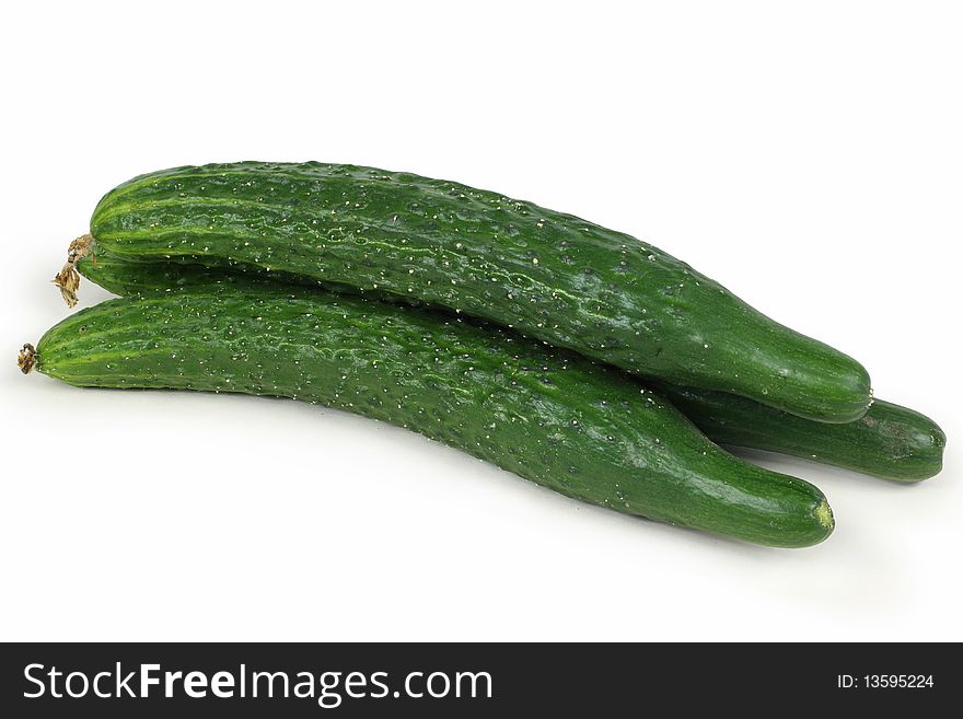 Green cucumber in isolated white background