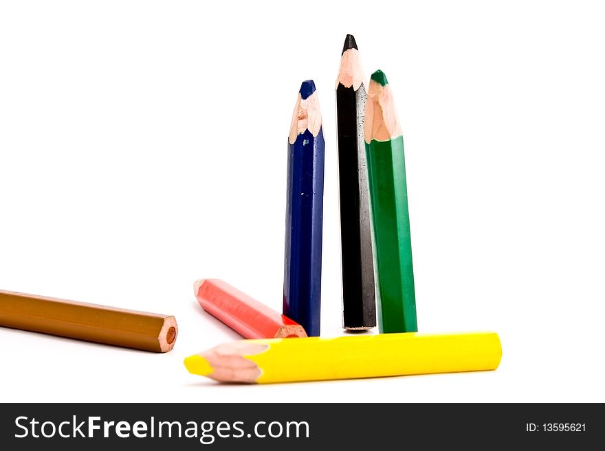 Thick pencils of different colors.