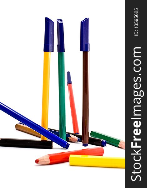 Thick pencils of different colors.