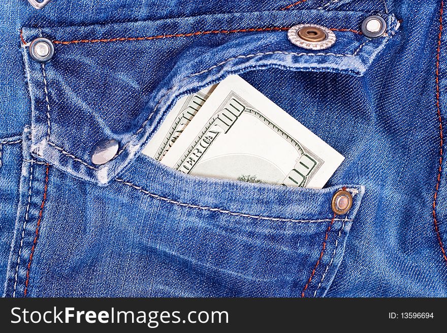 USA money in back pocket of blue jeans