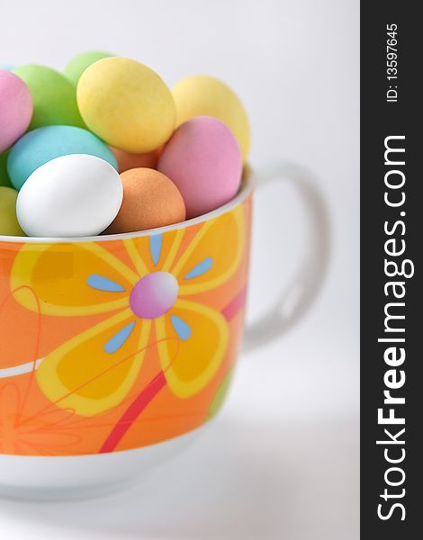 Colored Easter Eggs In A Cup