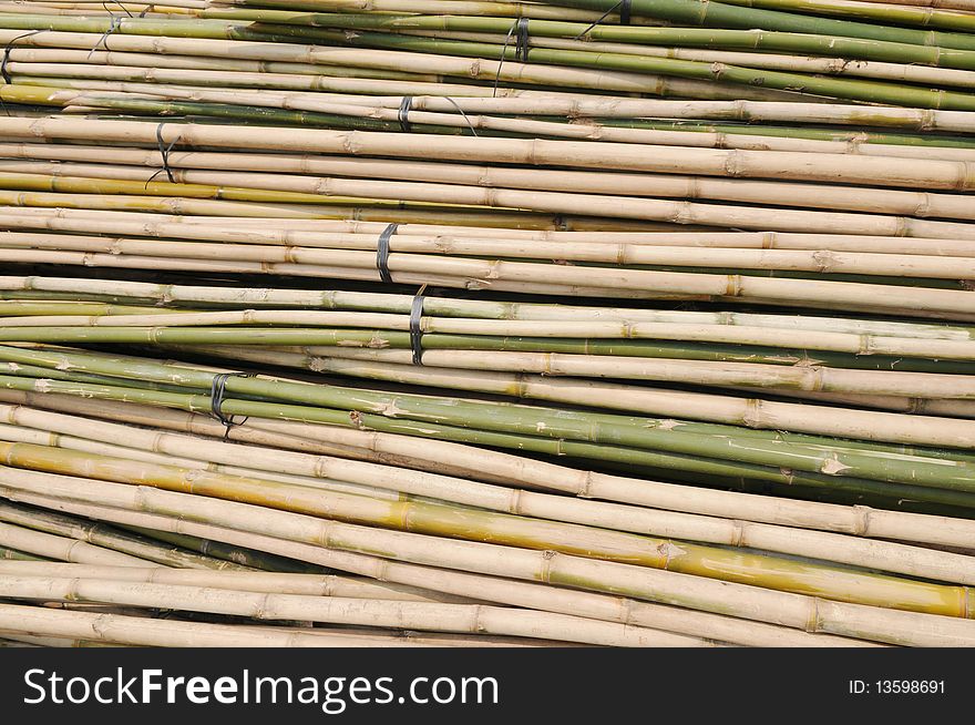 Bamboo stalk in bundle pile up in construction site. Bamboo stalk in bundle pile up in construction site.