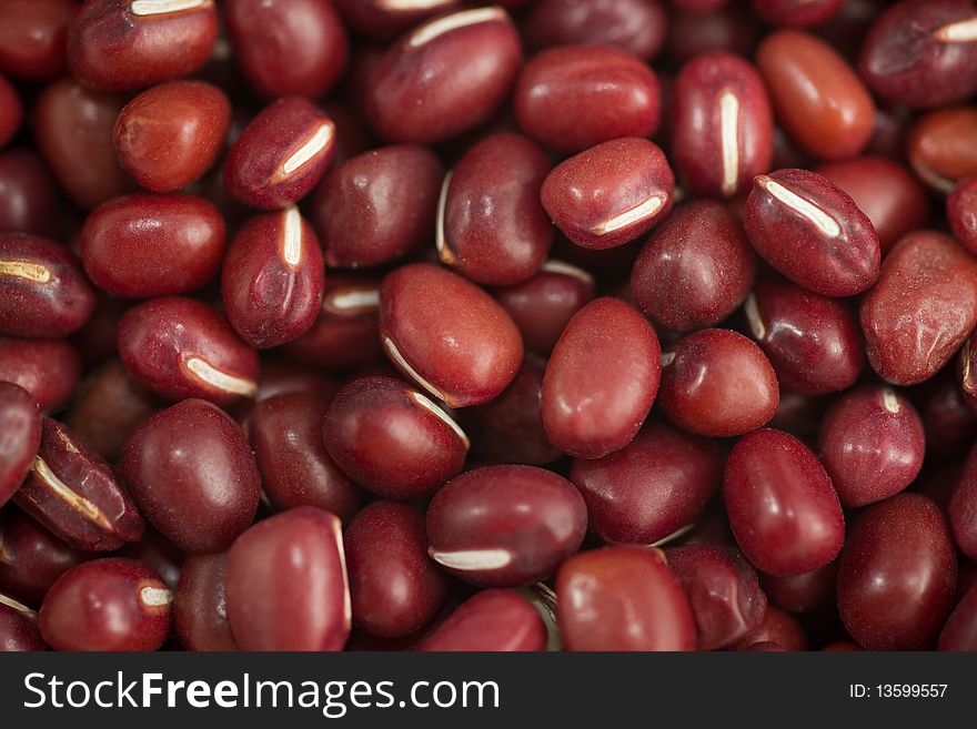 A pile of red adzuki beans, close up shot and selective focus.