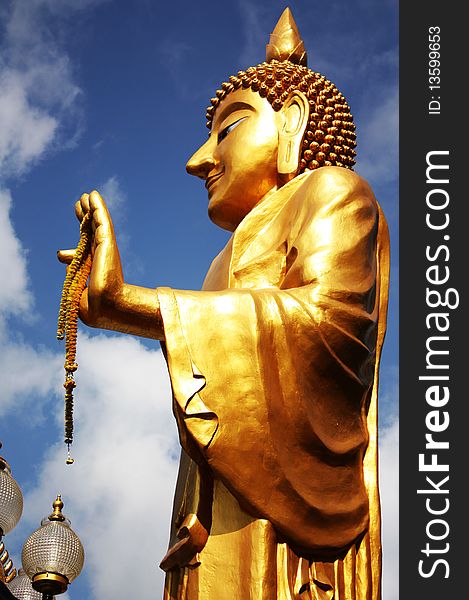 Standing Buddha at Lanboon temple. Bangkok Thailand.