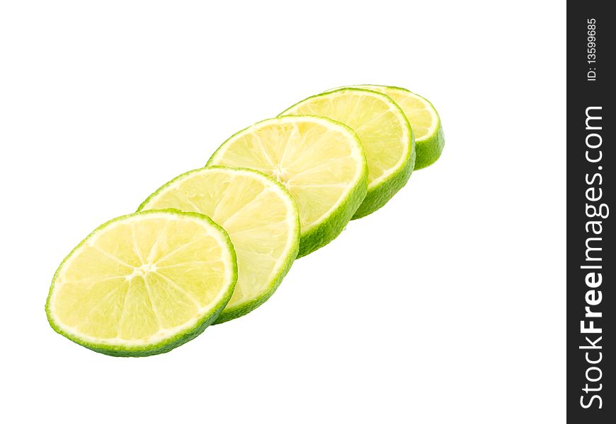 Five slices of limes on white background. Five slices of limes on white background