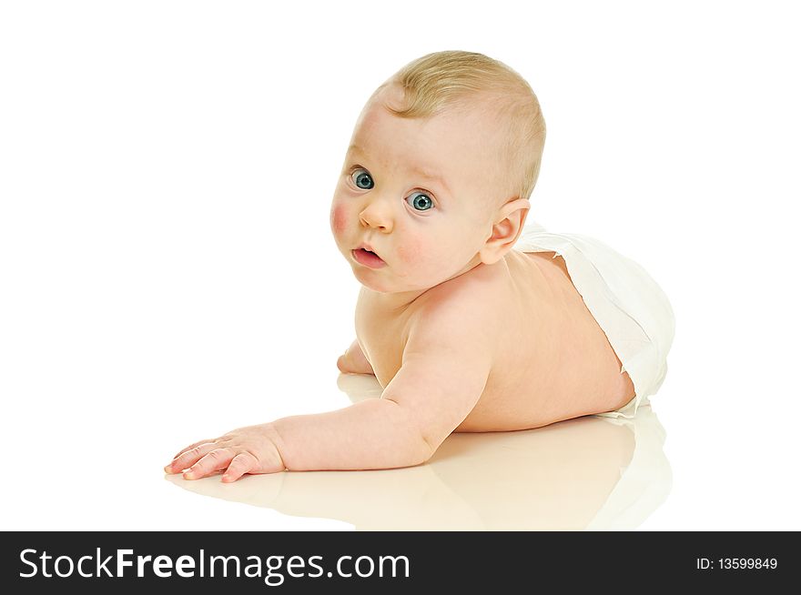 Lying six month baby on white background. Lying six month baby on white background