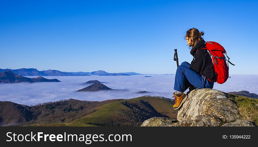 Successful Woman Backpacker Enjoy The View On Mountain Peak