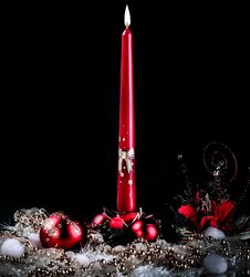 Candle And Christmas Composition On A Black Background Stock Images