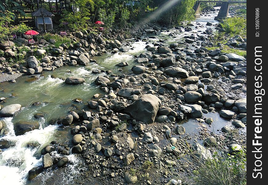 Beautifull scenery of rock and river in village side