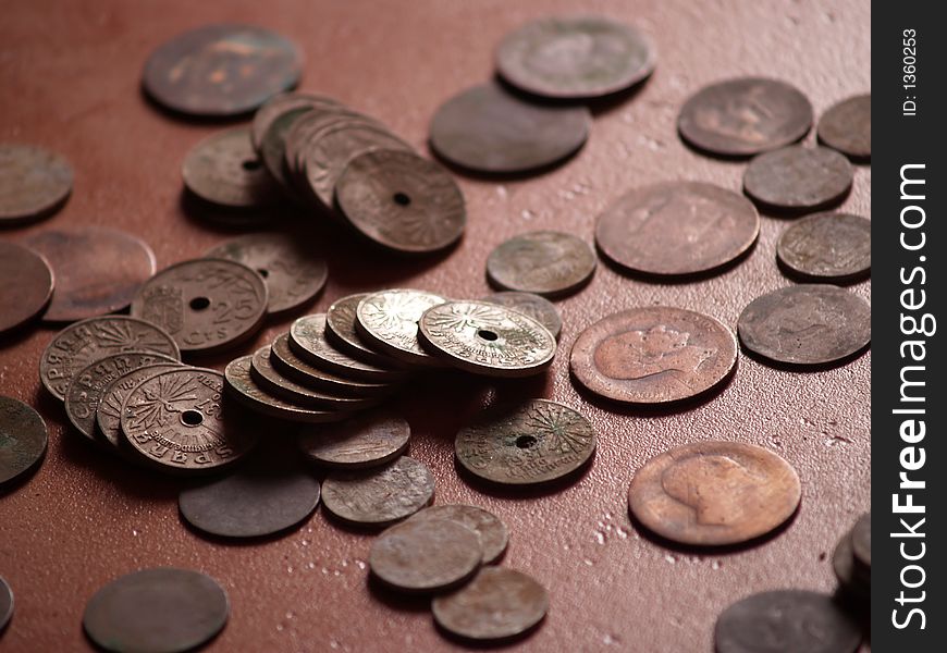 Old spanish coins scattered around