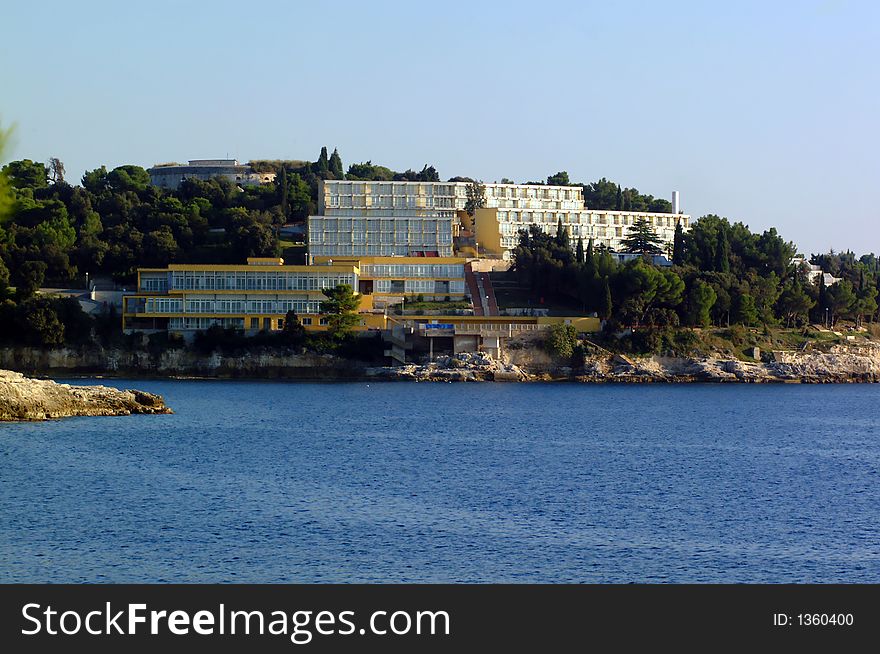 Hotel on a rocky cliff overlooking the sea