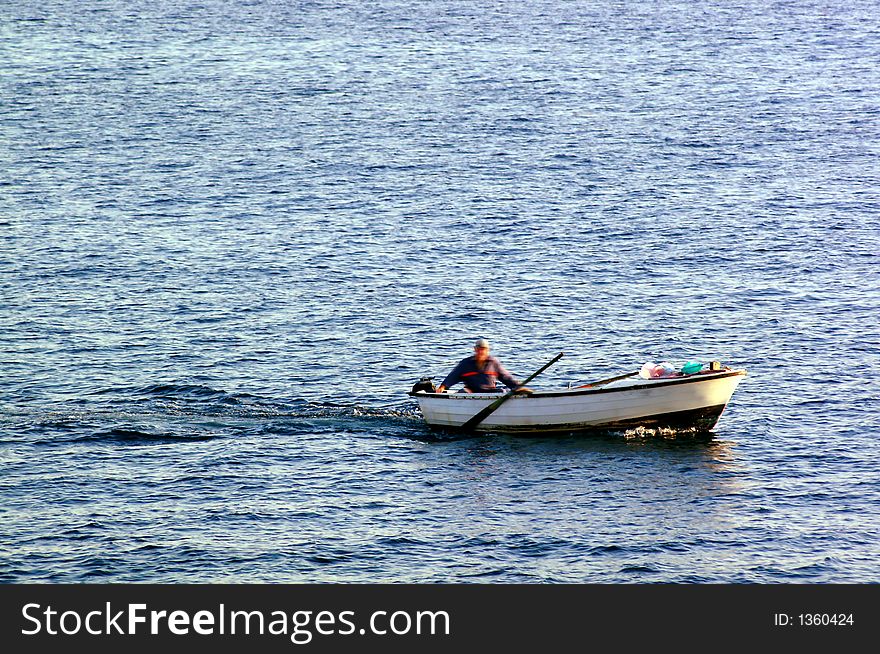 Fisherman on a small boat. Fisherman on a small boat