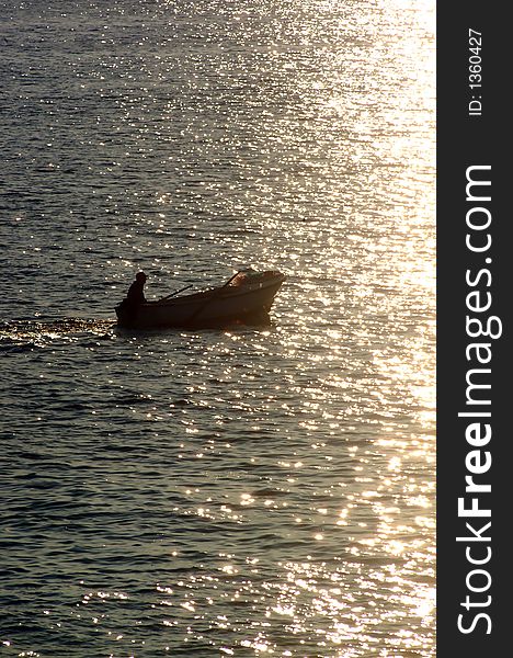 Fisherman on a small boat. Fisherman on a small boat