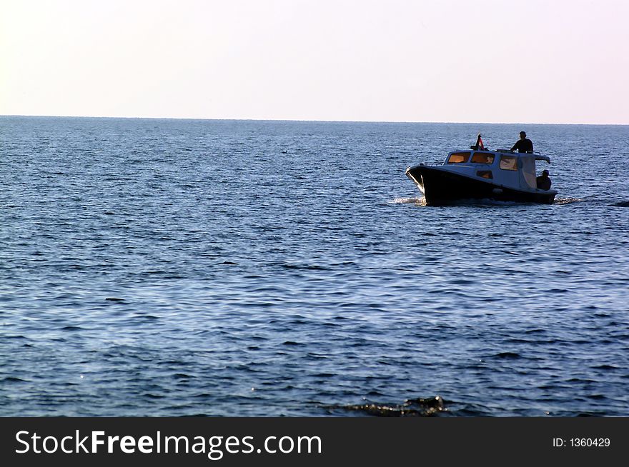 Fisherman on a small boat. Fisherman on a small boat