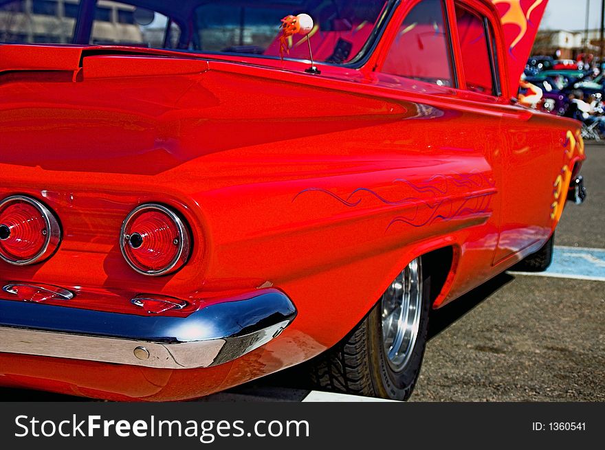 Classic Red 60s Chevy with tail lamps