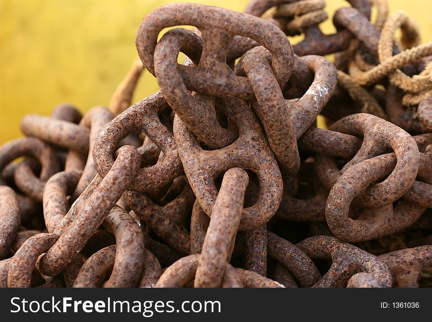 In a harbor in denmark  a rusted  chain. In a harbor in denmark  a rusted  chain