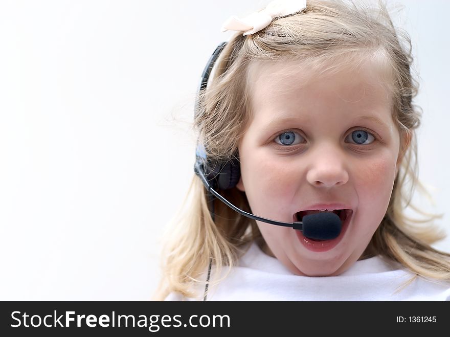Young Girl wearing telephone headset