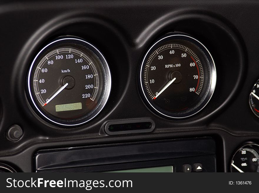 Close-up of two dials on motorcycle