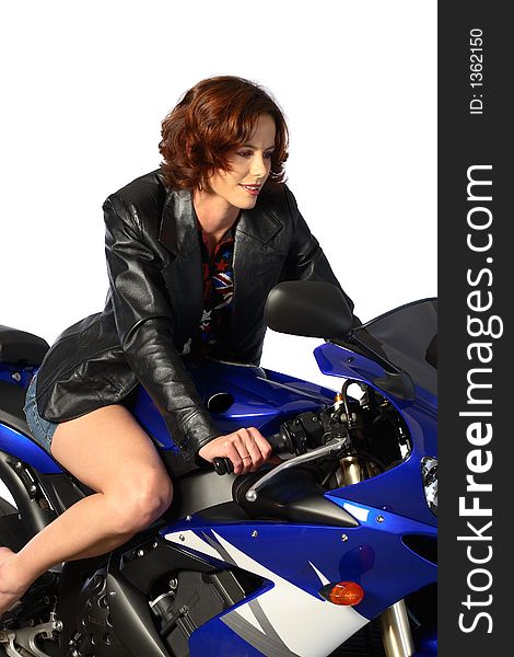 Brunette girl on motorcycle leather jacket