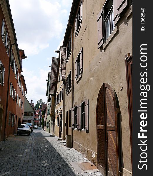 Typical narrow alley in a small historic Bavarian town. Typical narrow alley in a small historic Bavarian town