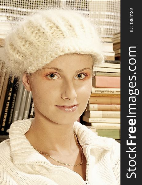 Girl, young woman in  a woollen white hat