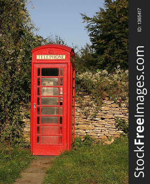 Red Phone Box in country location vertical format