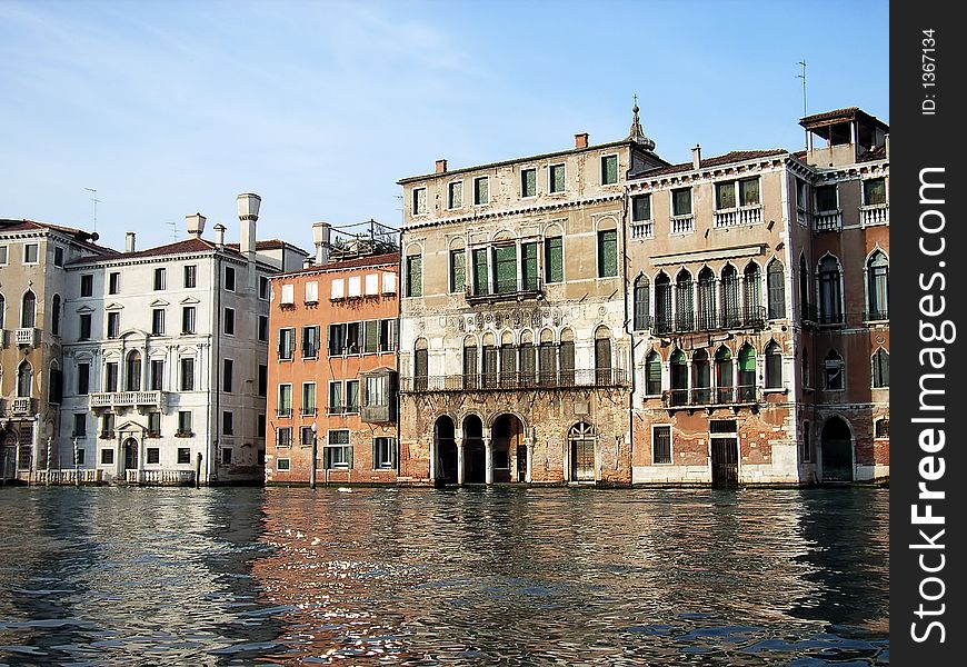 Flooden houses in a channel of Venice (Italy). Flooden houses in a channel of Venice (Italy)