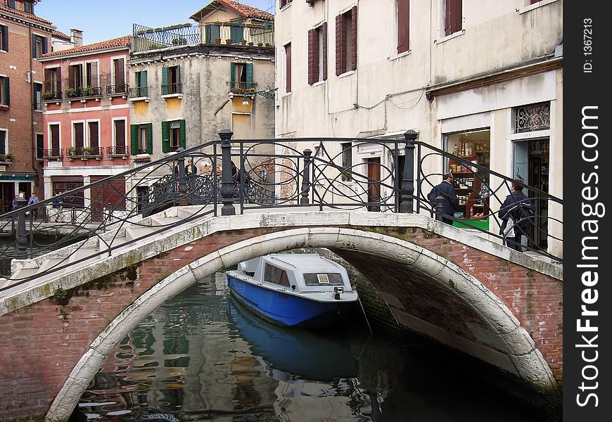Bridge crossing a channel in Venice (Italy). Bridge crossing a channel in Venice (Italy)