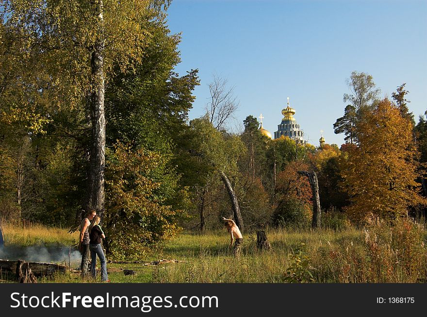 People and snags near church in New Jerusalem near Istra, Moscow region, Russia